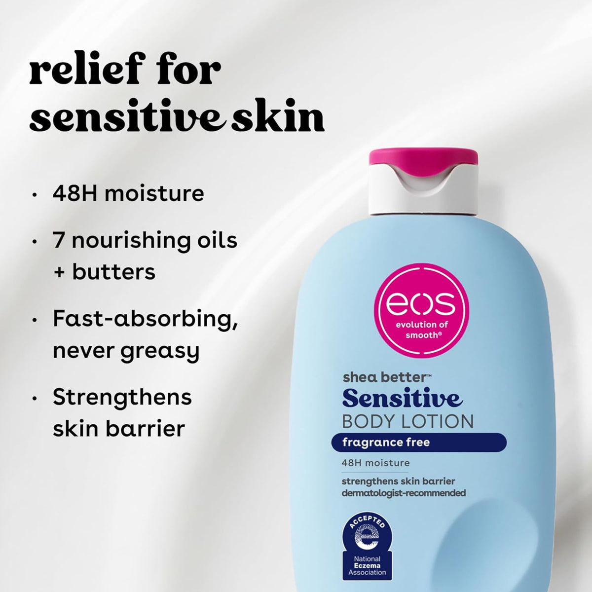 eos Shea Better Sensitive Body Lotion, parfümfreie Flasche mit hellblauem Etikett und rosa Verschluss, beruhigt empfindliche Haut 48 Stunden lang.
