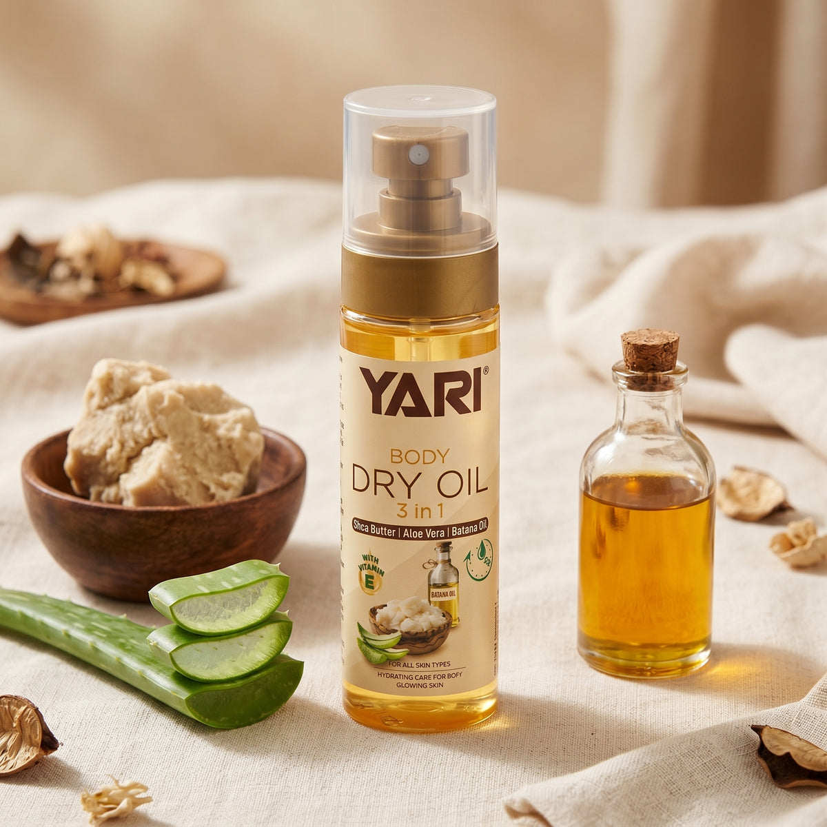 Yari Body Dry Oil 3 in 1 mit Sheabutter, Aloe Vera und Batanaöl, umgeben von natürlichen Inhaltsstoffen.